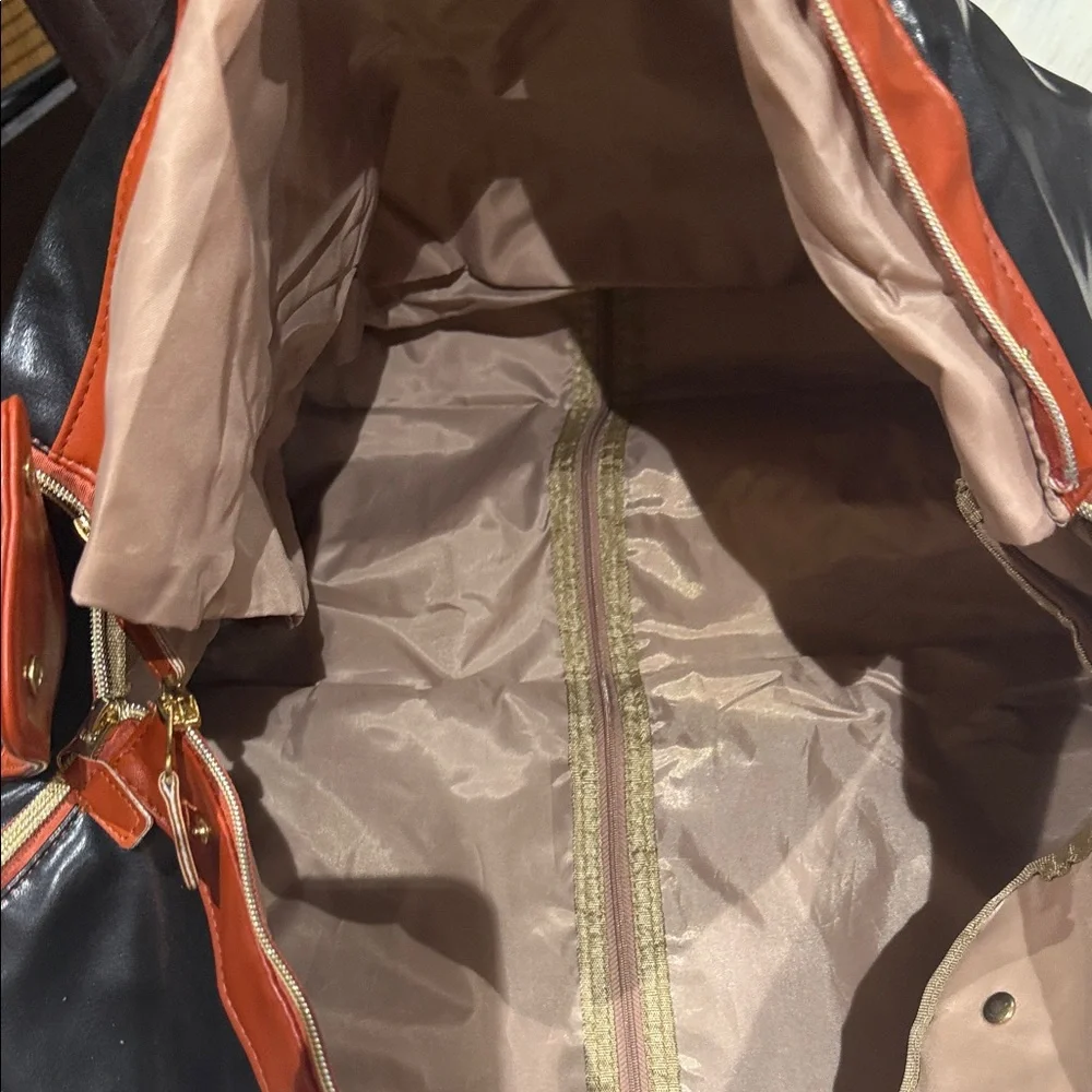 Elegant Retro Black and Tan Travel Duffle